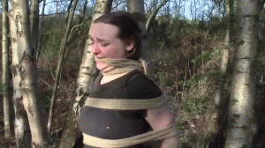 www.cuffkeybondage.com - Captured Kerry Tied To a Tree thumbnail